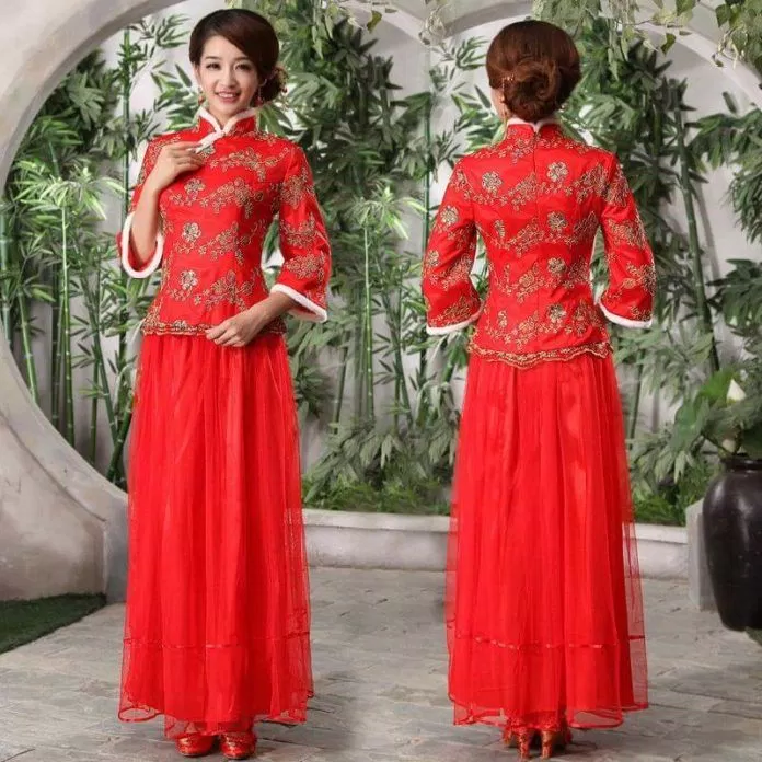 Cô dâu Trung Quốc duyên dáng với váy cưới màu đỏ theo kiểu dáng truyền thống. (ảnh: internet)
