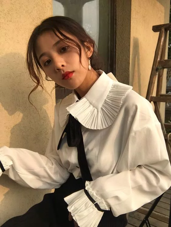 Áo sơ mi tay loe bèo nhún