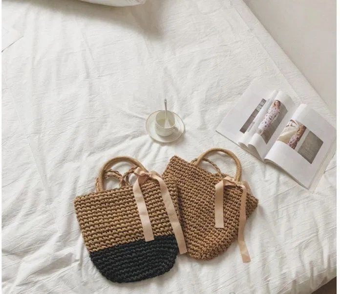 Màu sắc trang nhã và thiết kế tinh tế, những chiếc túi cói này sẽ không làm cho nàng thất vọng. (Nguồn: Internet)