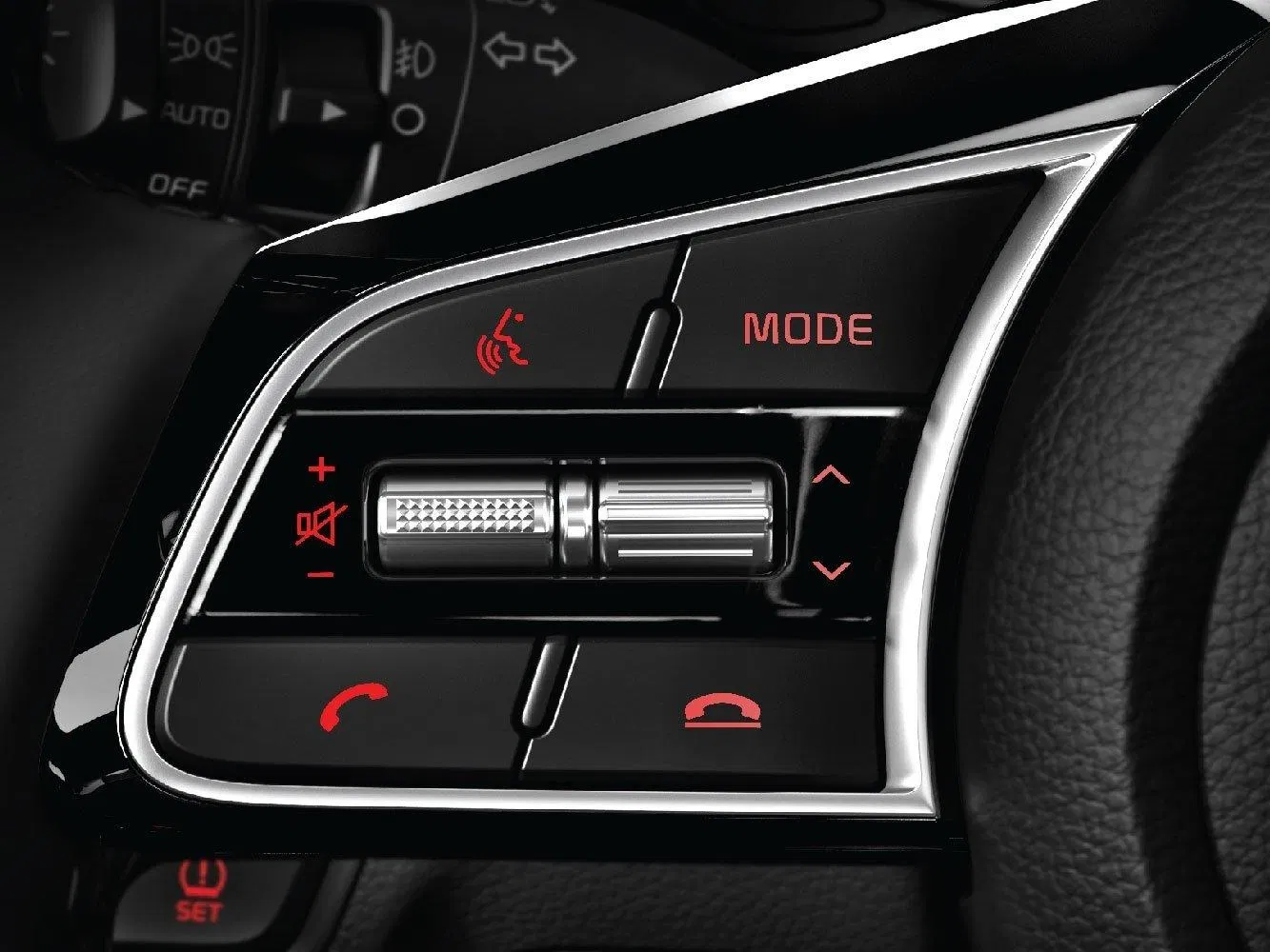 Cụm nút điều khiển âm thanh trên vô lăng thiết kế mới với viền ngoài mạ chrome tạo nên không gian lái hiện đại.