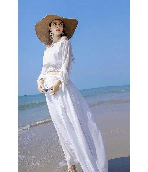 Thướt tha yểu điệu khi kết hợp áo trễ vai với chân váy dài. (nguồn: Internet)