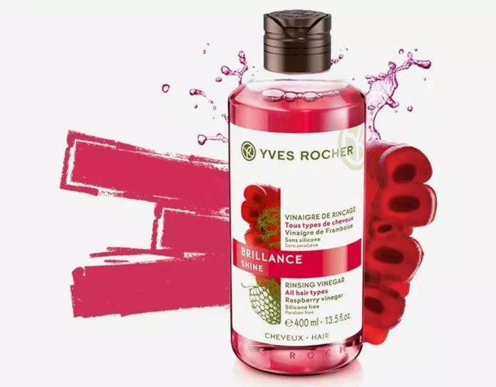 Giấm xả tóc "mâm xôi đỏ" Yves Rocher có kết cấu dạng lỏng, màu đỏ rượu. (nguồn: Internet)