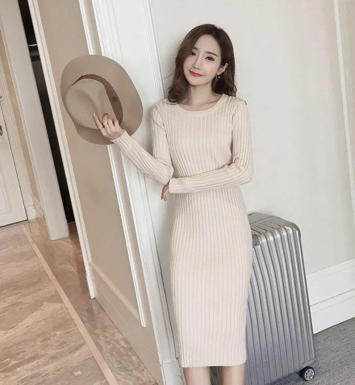 Váy len trắng dáng dài giúp bạn trông tươi sáng hơn vào mùa đông. (nguồn ảnh: internet.)
