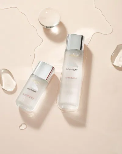 Review dưỡng chất căng mướt da LOréal Paris Revatalift Crystal Micro Essence BHA (Salicylic Acid) chăm sóc làn da mịn màng chiết xuất lá cỏ hổ dưỡng ẩm cho da dưỡng chất căng mướt da loréal giúp da săn chắc LOréal LOréal Paris Revatalift Crystal Micro Essence mờ thâm