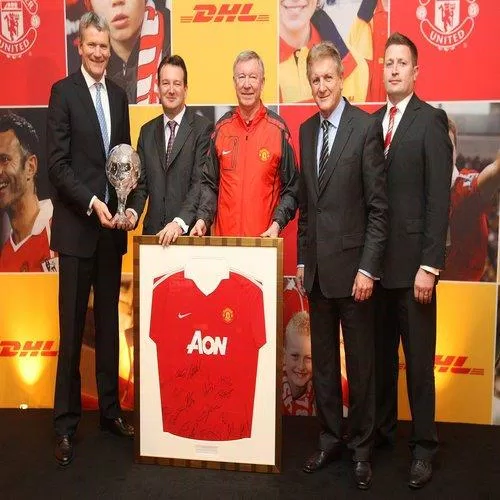 MANCHESTER, ENGLAND - FEBRUARY 11: Sir Alex Ferguson (C), David Gill (L) and Richard Arnold (R) of Manchester United pose with David Wilson (2nd L) and Phil Couchman from DHL after a press conference to announce DHL as new partners of Manchester United at Old Trafford on February 11, 2011 in Manchester, United Kingdom. (Photo by John Peters/Man Utd via Getty Images) *** Local Caption *** Alex Ferguson; David Gill; Richard Arnold; David Wilson; Phil Couchman