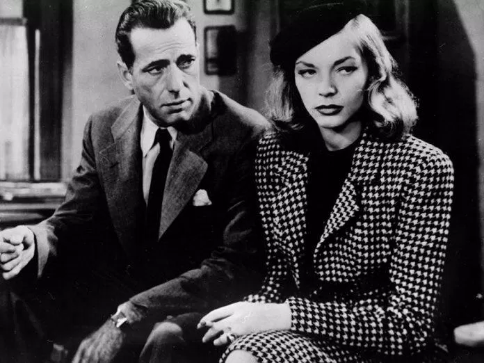 Thám tử Philip Marlowe (Humphrey Bogart) và Vivian Sternwood (Lauren Bacall) (ảnh: Internet) Thám tử Philip Marlowe (Humphrey Bogart) và Vivian Sternwood (Lauren Bacall) (ảnh: Internet)