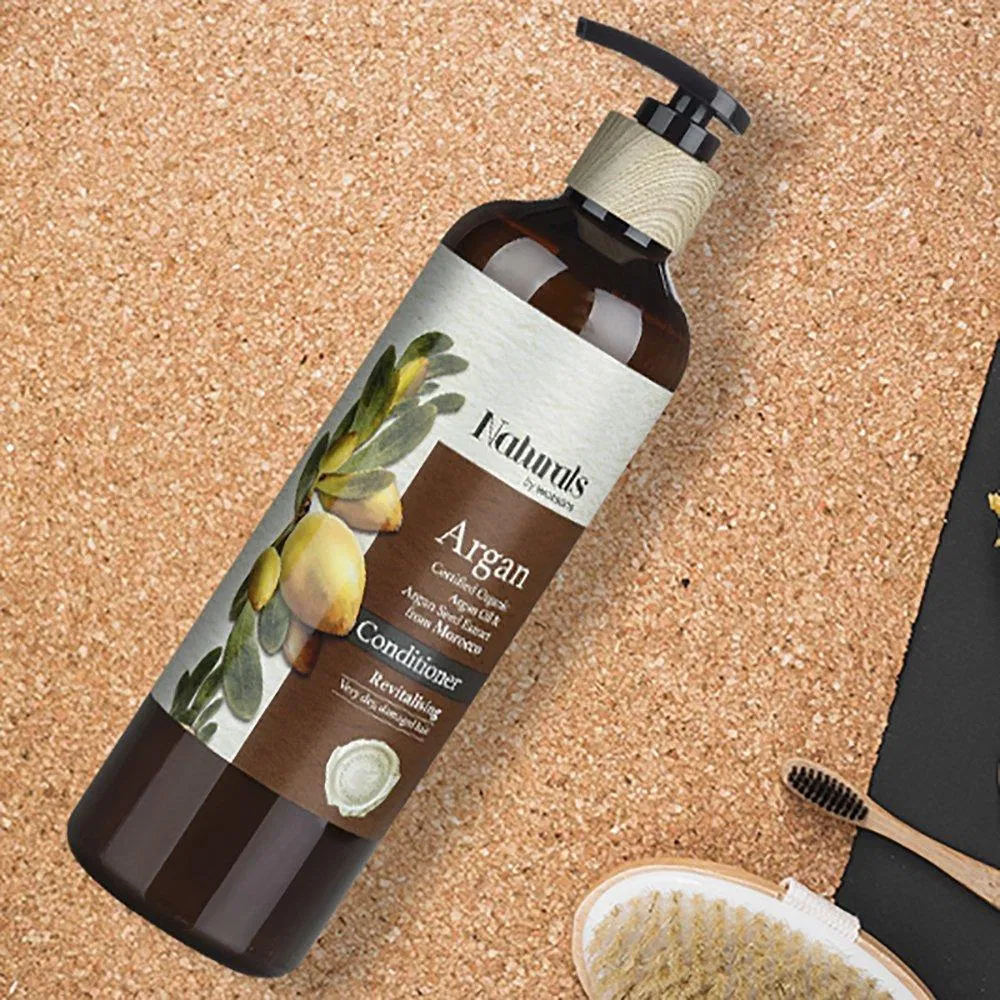 Dầu xả phục hồi Naturals by Watsons chiết xuất Argan giúp phục hồi và nuôi dưỡng tóc dẻo da (Nguồn: Internet).