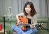 Kim Suyoung với phong cách âm nhạc acoustic. (Nguồn: Internet)