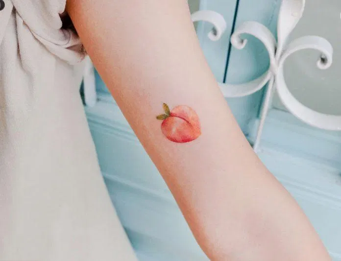 Hình xăm trái đào đáng yêu. (Ảnh: Nguyễn Thị Hải Hà) Hình xăm trái đào đáng yêu. (Ảnh: Nguyễn Thị Hải Hà)