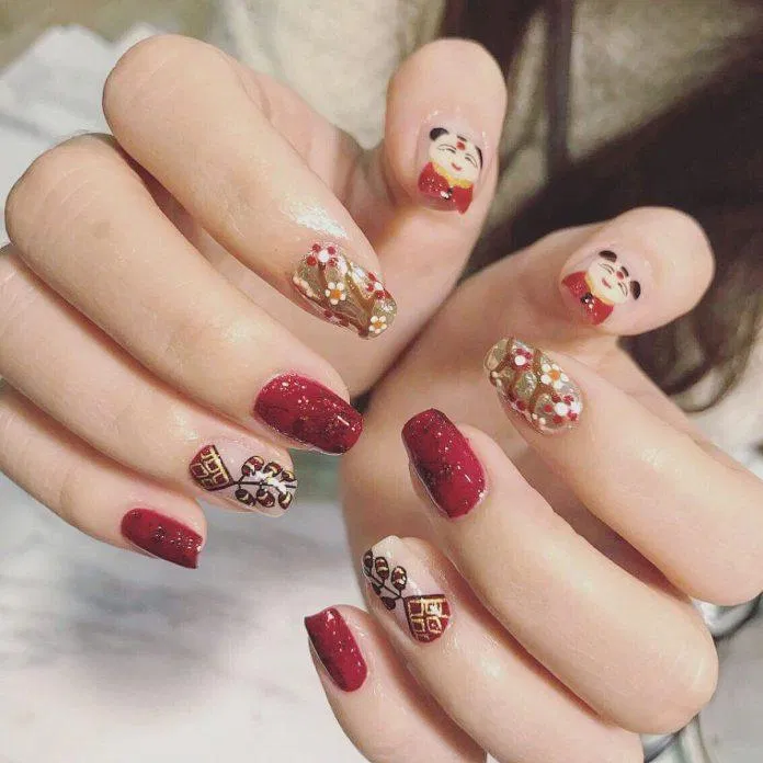Mẫu nail Tết 2023 màu đỏ may mắn (Ảnh: Internet)
