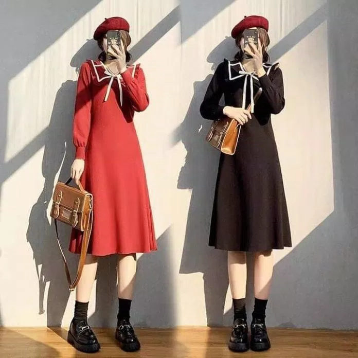 Váy dài qua gối kết hợp với đôi boot và mũ nồi là combo cực xinh (Nguồn: BlogAnChoi)