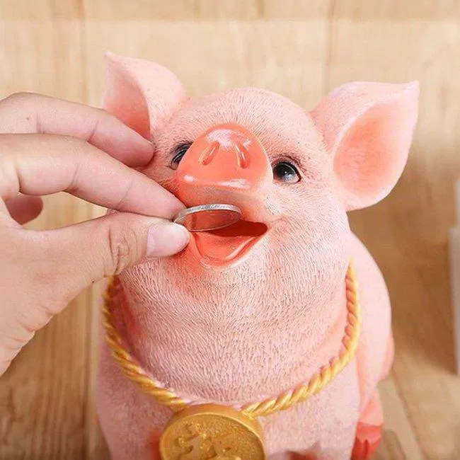 Bạn vẫn nhớ thói quen "bỏ ống heo" lúc nhỏ chứ? (Ảnh: Internet). Bạn vẫn nhớ thói quen "bỏ ống heo" lúc nhỏ chứ? (Ảnh: Internet).