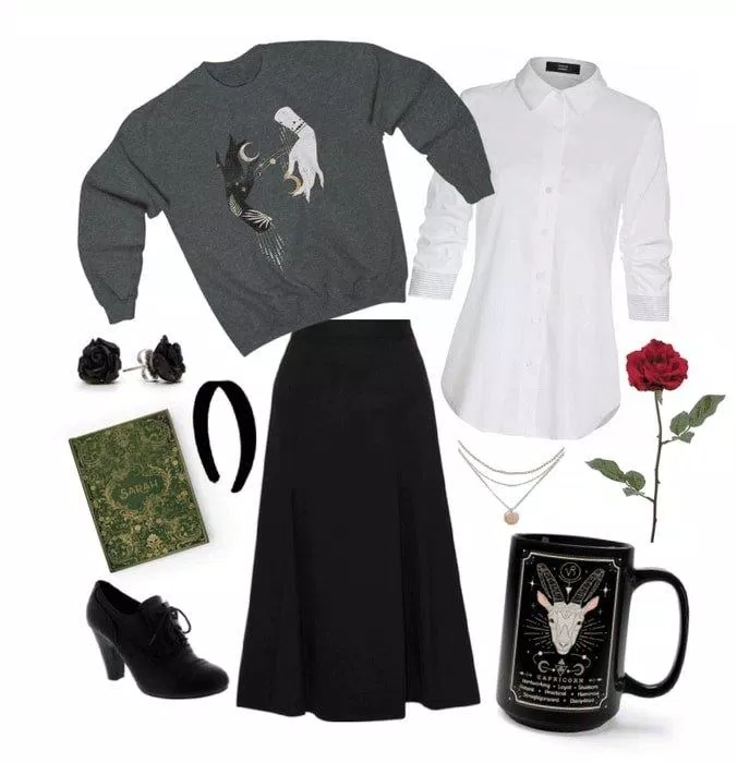 Sơ mi trắng cùng sweater và chân váy dài tối màu cùng giày cao gót cổ thấp (Nguồn: Internet)