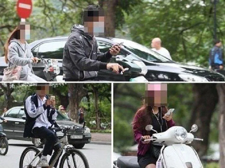 Rất dễ bắt gặp cảnh vừa đi xe vừa dùng điện thoại như thế này trên đường phố (Ảnh: Internet). Rất dễ bắt gặp cảnh vừa đi xe vừa dùng điện thoại như thế này trên đường phố (Ảnh: Internet).