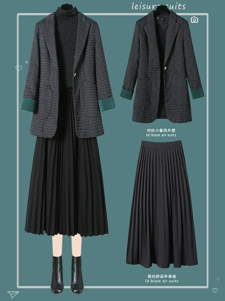 Blazer dáng dài một chút xinh hêt nấc khi mix cùng chân váy xếp li (Nguồn: BlogAnChoi) Blazer dáng dài một chút xinh hêt nấc khi mix cùng chân váy xếp li (Nguồn: BlogAnChoi)