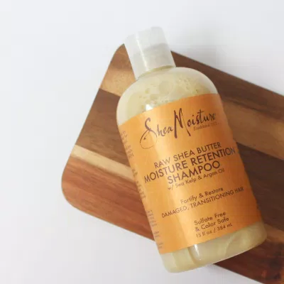 Dầu gội SheaMoisture Raw Shea Butter Moisture Retention Shampoo dưỡng tóc suôn mềm, óng ả (ảnh: internet)