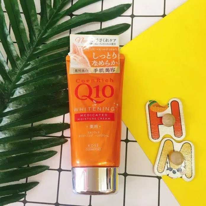 Kem dưỡng da tay Kose Coenrich Q10 Whitening Medicated Hand Cream phiên bản màu cam (ảnh: internet)