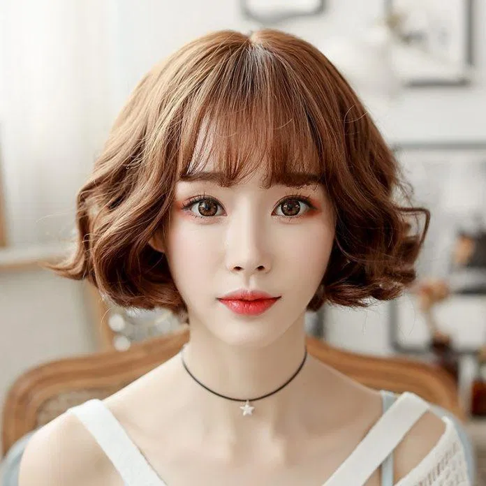 Kiểu tóc ngắn đẹp uốn xoăn bồng bềnh nữ tính. (Ảnh: Internet) Kiểu tóc ngắn đẹp uốn xoăn bồng bềnh nữ tính. (Ảnh: Internet)