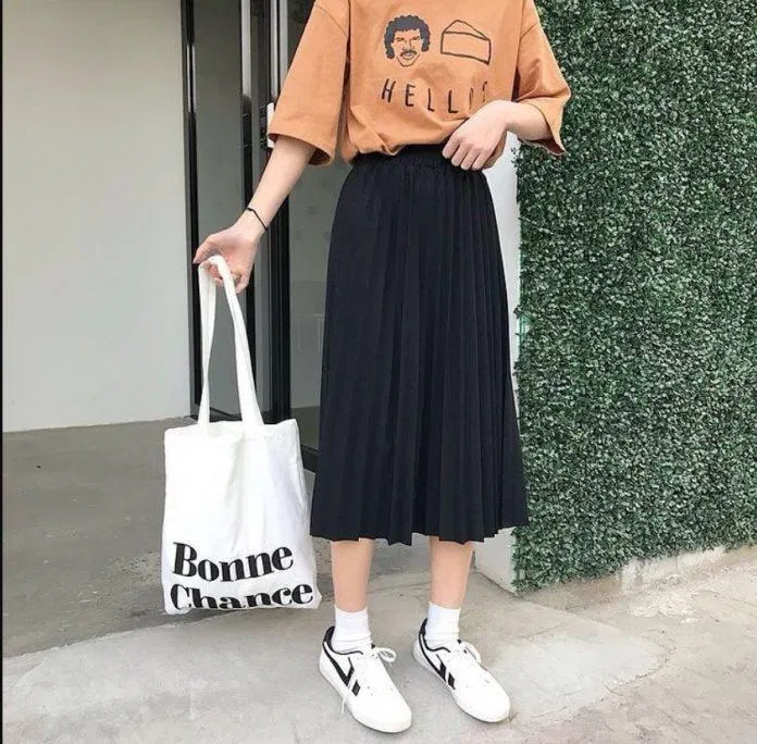 Váy ngang bắp chân là gợi ý cho nàng chân ngắn mà thích váy dài (Nguồn: Internet) Váy ngang bắp chân là gợi ý cho nàng chân ngắn mà thích váy dài (Nguồn: Internet)