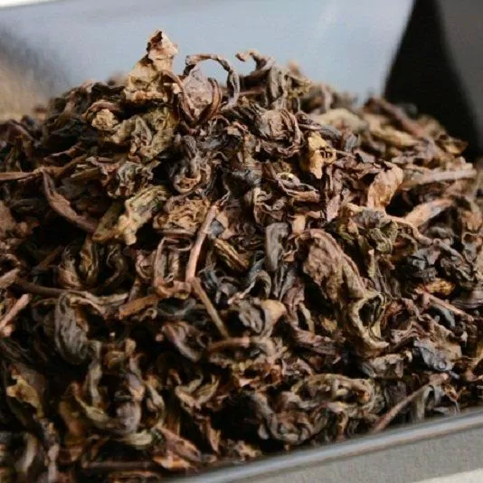 Trà ô long có màu sẫm hơn các loại trà khác (Ảnh: Internet). Trà ô long có màu sẫm hơn các loại trà khác (Ảnh: Internet).