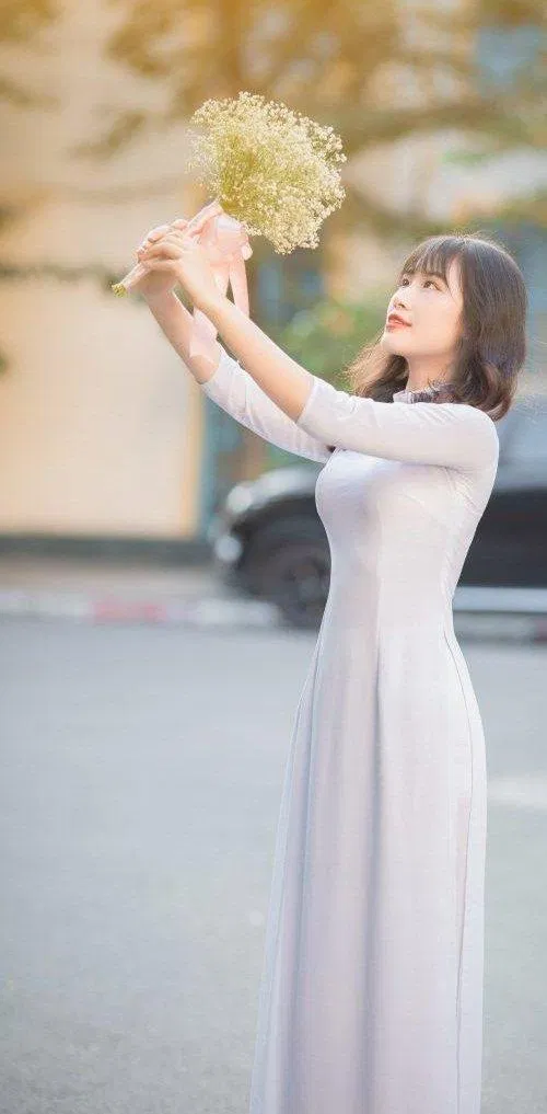 Chụp ảnh với hoa (Nguồn ảnh: Internet). Chụp ảnh với hoa (Nguồn ảnh: Internet).