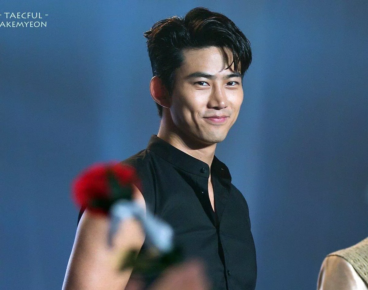 Taecyeon (2PM) rạng rỡ với má lúm đồng tiền khi cười. (Nguồn: Internet)