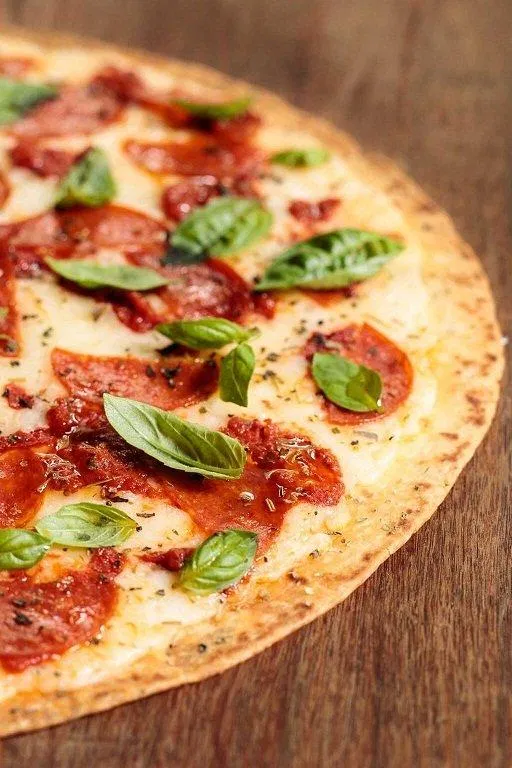 Bánh pizza vỏ mỏng tốt hơn so với vỏ dày (Ảnh: Internet). Bánh pizza vỏ mỏng tốt hơn so với vỏ dày (Ảnh: Internet).