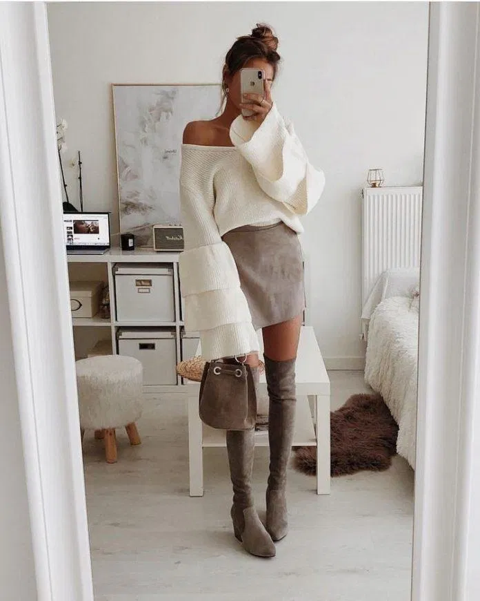 Áo len trễ vai giúp tăng thêm sự gợi cảm và nữ tính cho set đồ (Nguồn: Internet).