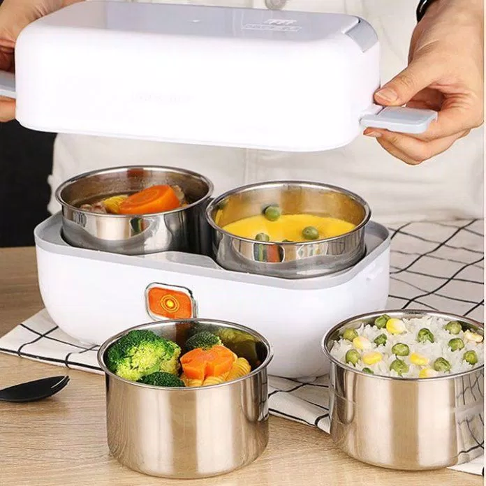 Chiếc nồi cơm “chân ái” của dân công sở (Nguồn: Internet) Chiếc nồi cơm “chân ái” của dân công sở (Nguồn: Internet)