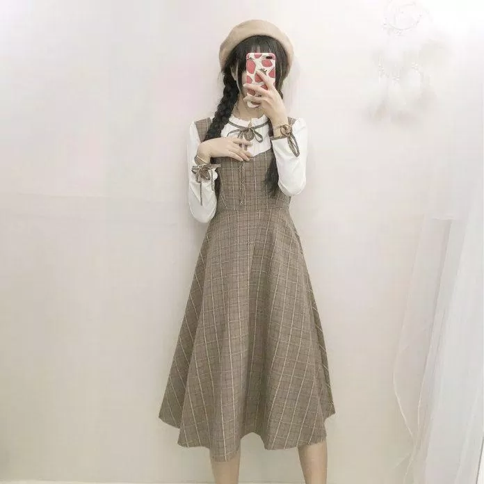 Váy xiết eo nhẹ không làm lộ eo bánh mì (Nguồn: Internet) Váy xiết eo nhẹ không làm lộ eo bánh mì (Nguồn: Internet)