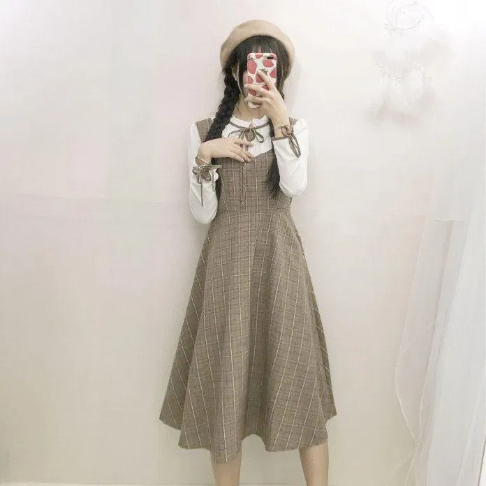Váy xiết eo nhẹ không làm lộ eo bánh mì (Nguồn: Internet) Váy xiết eo nhẹ không làm lộ eo bánh mì (Nguồn: Internet)