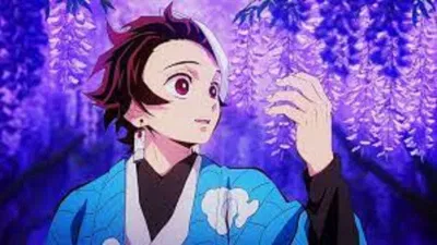 Vẻ đẹp của Tanjirou khi đứng trong vườn hoa tử đằng (Ảnh: Internet)