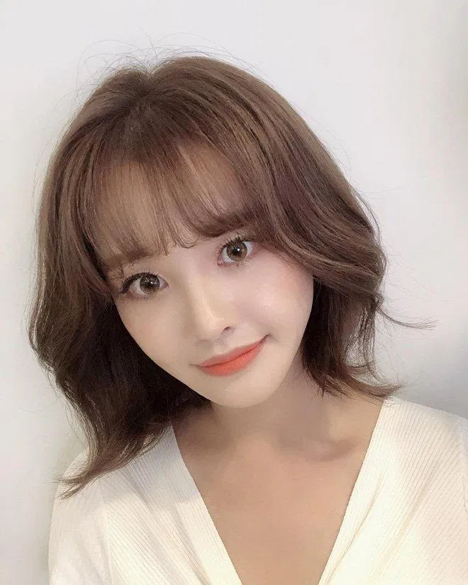 Tóc ngắn mái thưa tỉa layer nhẹ