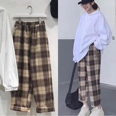 Áo thun kết hợp với quần lửng ống rộng là một sự lựa chọn vô cùng ăn ý (Nguồn: Internet) Áo thun kết hợp với quần lửng ống rộng là một sự lựa chọn vô cùng ăn ý (Nguồn: Internet)