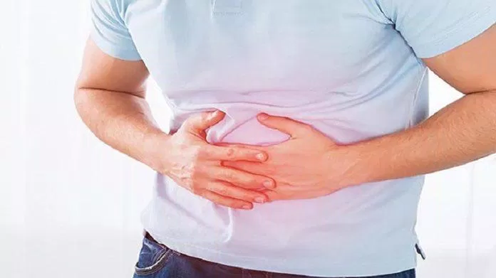 COVID-19 có thể gây triệu chứng tiêu hóa như đau bụng (Ảnh: Internet).