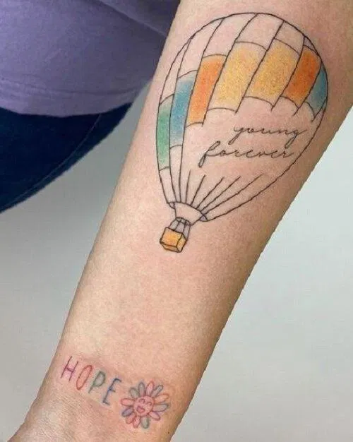 Hình xăm BTS: Khinh khí cầu Young Forever. (Ảnh: Internet) Hình xăm BTS: Khinh khí cầu Young Forever. (Ảnh: Internet)