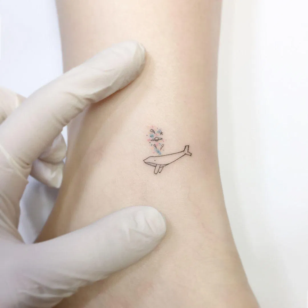 Hình xăm BTS: Cá voi cô đơn. (Ảnh: Internet) Hình xăm BTS: Cá voi cô đơn. (Ảnh: Internet)