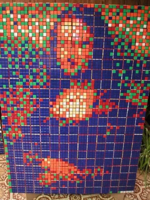 Bức tranh Mona Lisa được tạo thành từ các khối rubik (Nguồn: Internet) Bức tranh Mona Lisa được tạo thành từ các khối rubik (Nguồn: Internet)
