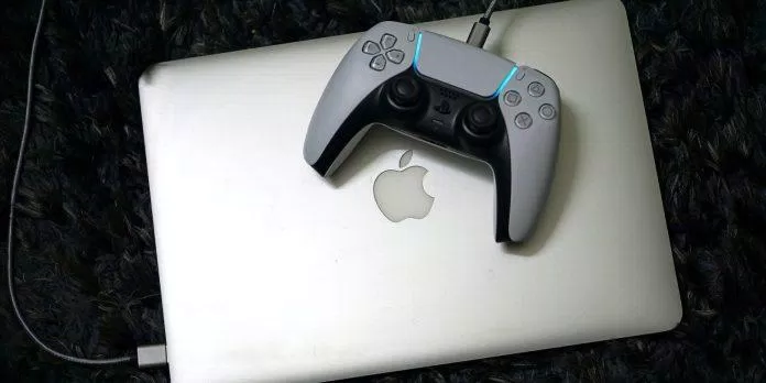 MacBook kết nối với tay cầm chơi game DualSense (Ảnh: Internet). MacBook kết nối với tay cầm chơi game DualSense (Ảnh: Internet).