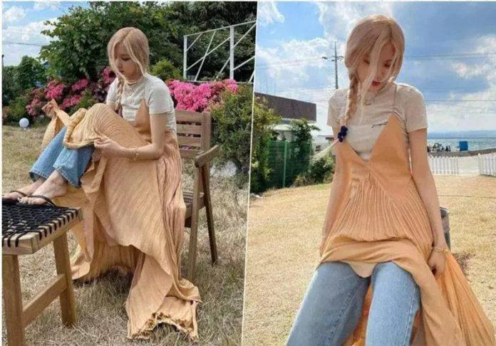 Rosé mix váy hai dây kết hợp thêm quần jean. Nguồn: Internet