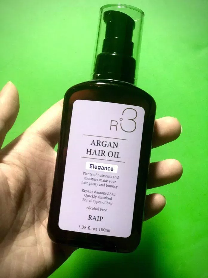Bao bì và thiết kế sản phẩm R3 Argan Hair Oil. Mình tậu về nhà chai màu tím (Elegance). (Nguồn: BlogAnChoi).