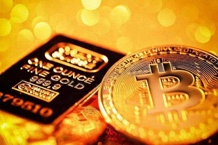 Bitcoin được nhiều người coi là tài sản cất trữ an toàn lâu dài giống như vàng (Ảnh: Internet). Bitcoin được nhiều người coi là tài sản cất trữ an toàn lâu dài giống như vàng (Ảnh: Internet).