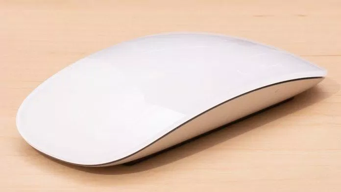 Chuột Magic Mouse của Apple có hình dạng dẹt và bề mặt cảm ứng (Ảnh: Internet)