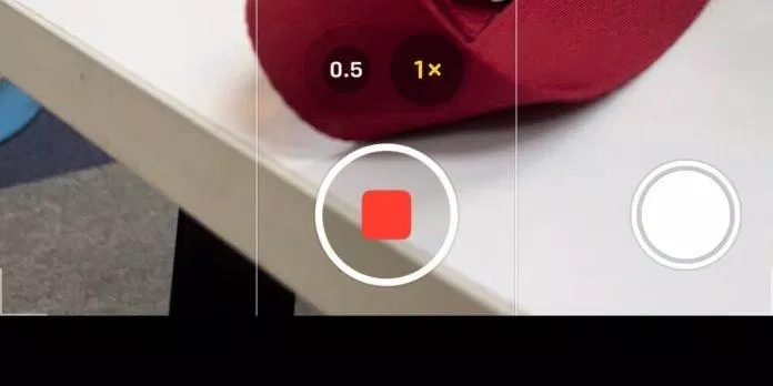 Nhấn nút màu trắng để chụp ảnh trong lúc đang quay video (Ảnh: Internet)
