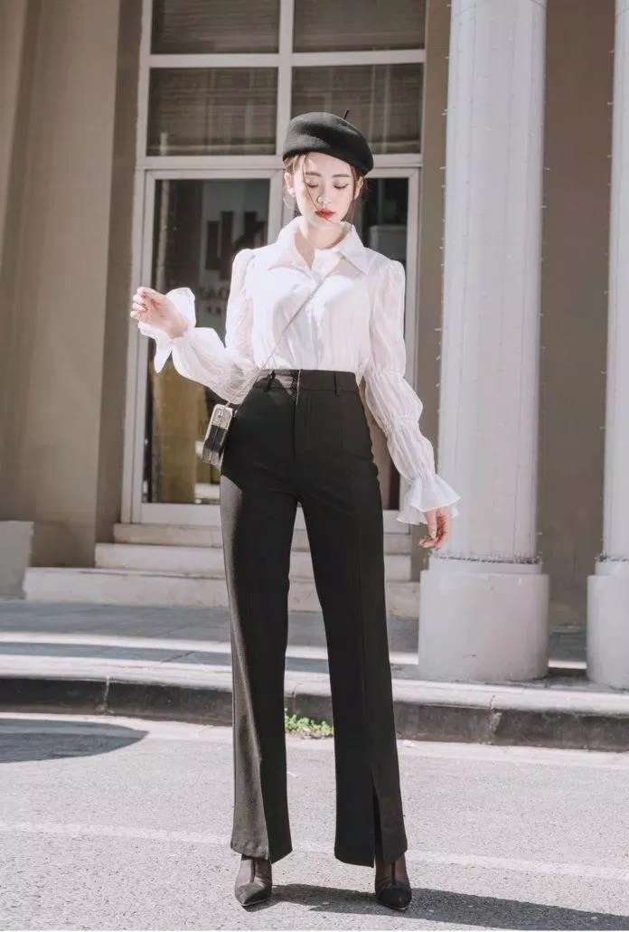 Thời trang và sành điệu với sơ mi kiểu kết hợp với quần tây ống loe, mũ nồi và giày cao gót (Ảnh: Internet)