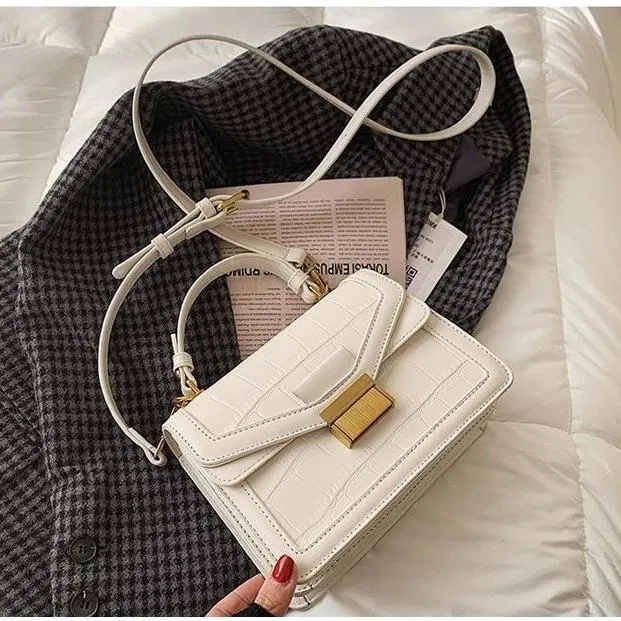 Khám phá những mẫu túi xách siêu hot trong năm 2022 khám phá làm đẹp năm 2022 phong cách thời trang phù hợp thời trang túi dạng rút túi dáng thuyền Túi đeo chéo túi hộp túi kẹp nách túi xách