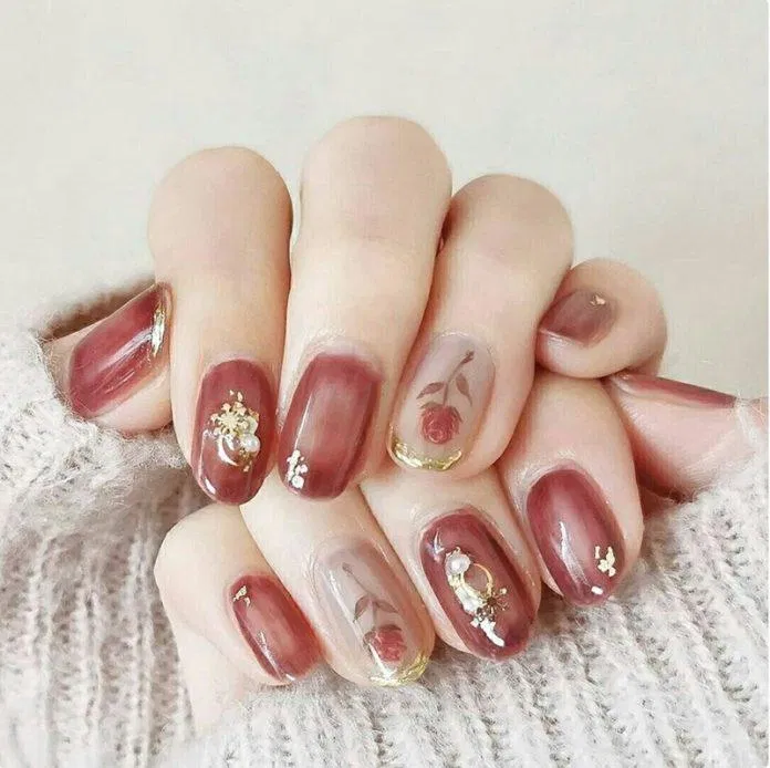 Mẫu nail Tết 2023 màu đỏ rực rỡ, nổi bật. (Ảnh: Internet)