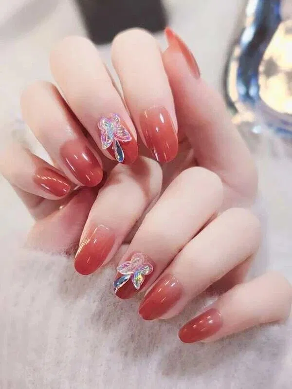 Mẫu nail Tết 2023 màu đỏ rực rỡ, nổi bật. (Ảnh: Internet)