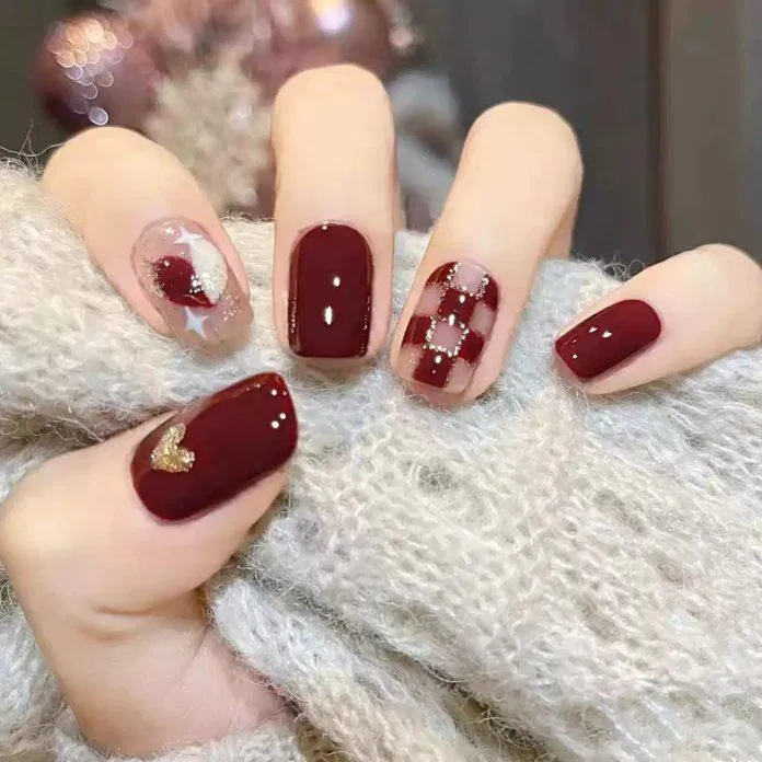 Mẫu nail Tết 2023 màu đỏ rực rỡ, nổi bật. (Ảnh: Internet)