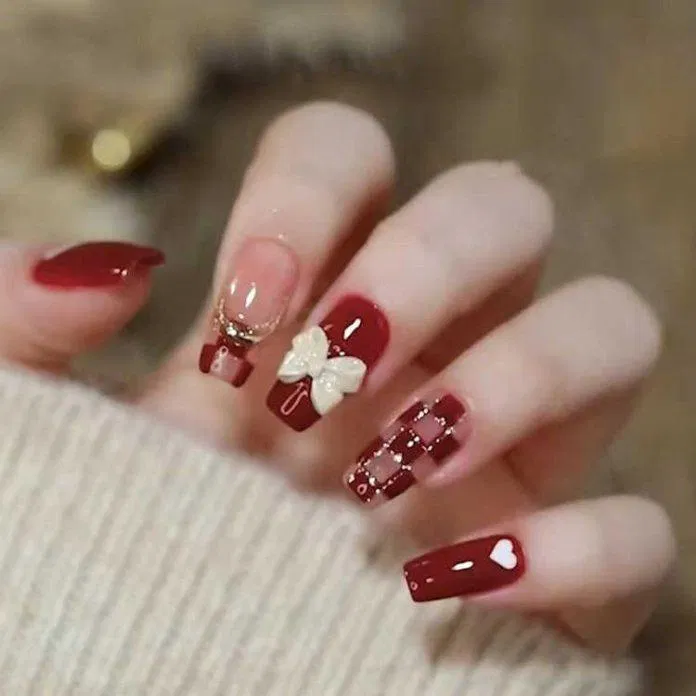Mẫu nail Tết 2023 màu đỏ rực rỡ, nổi bật. (Ảnh: Internet)